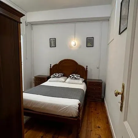 Quarto em Acomodações Particulares Apartamento Conde Do Redondo *